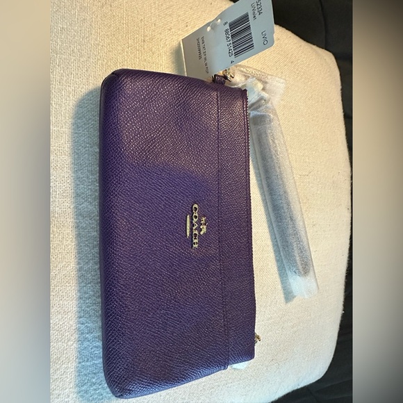 Coach Handbags - Coach violet wrist wallet